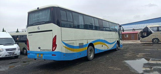 Le bus touristique utilisé pour l'Afrique a employé le bas kilomètre de Dragon Bus Yuchai Rear Engine 233kw 53seats de l'euro IV de châssis d'or d'airbag