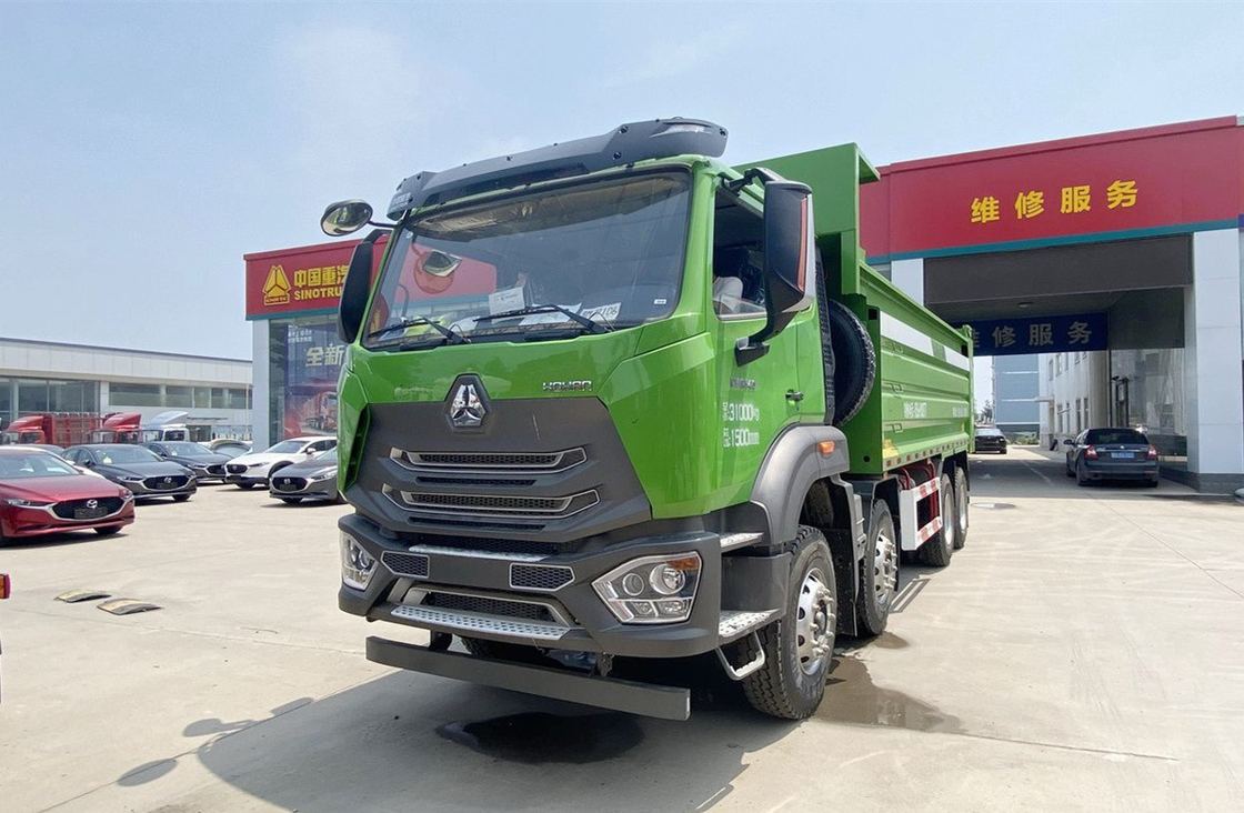Howo 8x4 camion de décharge 340 chevaux transport de déchets de construction urbaine 12 roues printemps à feuilles