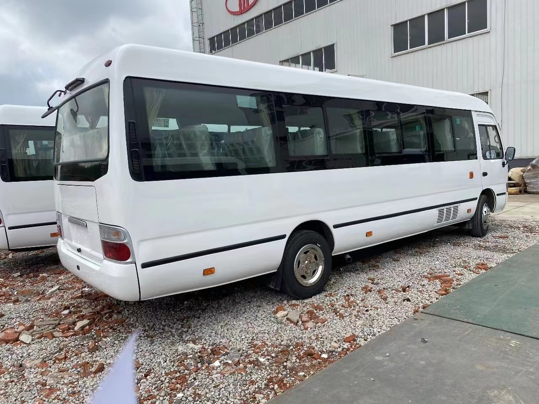 Minibus Mudan 30 places à main droite Utilisation en Tanzanie Printemps à feuilles pour une mauvaise route