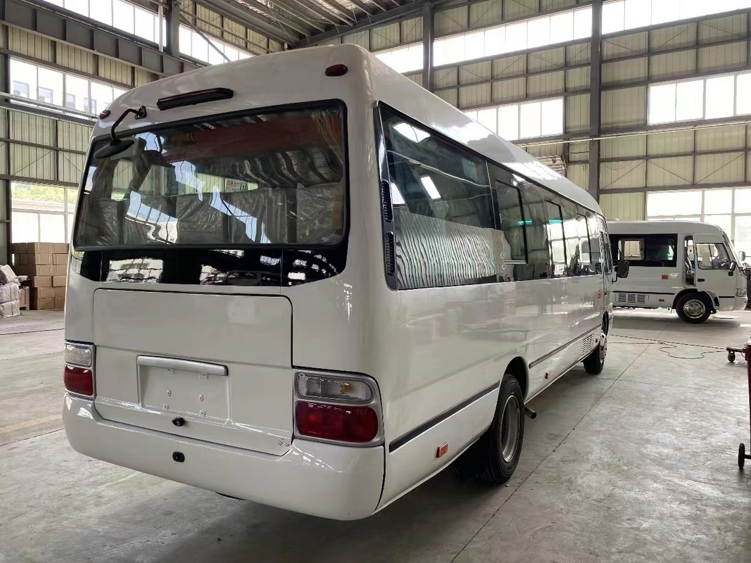 Minibus Mudan 30 places à main droite Utilisation en Tanzanie Printemps à feuilles pour une mauvaise route