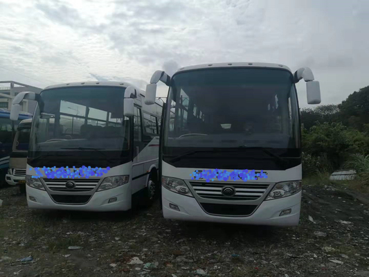 RHD/LHD a utilisé l'entraîneur Bus 2+3layout 60seats avec la suspension de butoir Yutong ZK6112D de ressort de plat